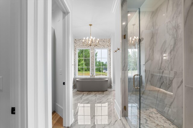 845 Audubon Way, Evans, GA 30809 - full bath with a chandelier, a marble finish shower, a freestanding bath, marble finish floors, and ornamental molding