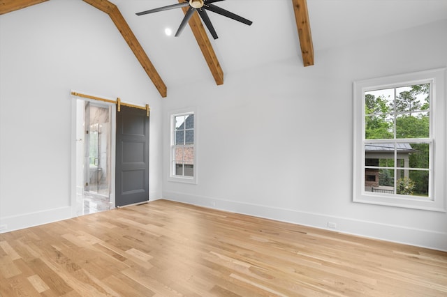 845 Audubon Way, Evans, GA 30809 - unfurnished room with ceiling fan, beam ceiling, light wood finished floors, baseboards, and healthy amount of natural light