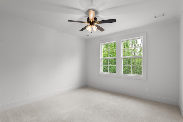 845 Audubon Way, Evans, GA 30809 - spare room with a ceiling fan, ornamental molding, light carpet, and baseboards