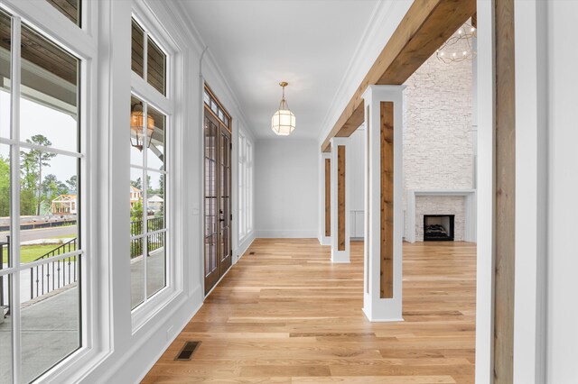 845 Audubon Way, Evans, GA 30809 - corridor featuring ornamental molding, plenty of natural light, light wood-style floors, baseboards, and french doors