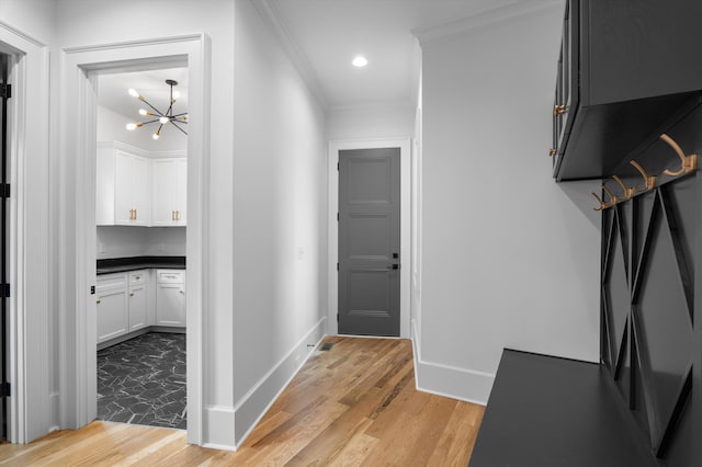 845 Audubon Way, Evans, GA 30809 - hallway with a chandelier, light wood-style flooring, crown molding, recessed lighting, and baseboards