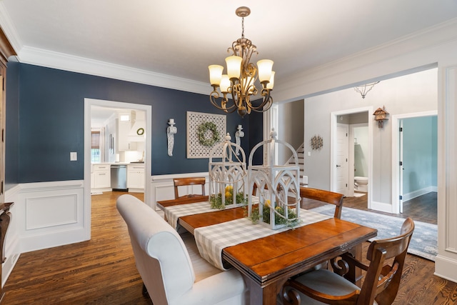 460 Armstrong Way, Evans, GA 30809 - dining room featuring a chandelier, crown molding, wood finished floors, and a wainscoted wall