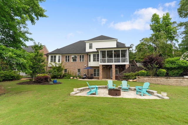 460 Armstrong Way, Evans, GA 30809 - back of property with a sunroom, a patio area, a fire pit, stairway, and brick siding