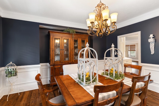 460 Armstrong Way, Evans, GA 30809 - dining room with a chandelier, crown molding, dark wood-type flooring, a wainscoted wall, and a decorative wall