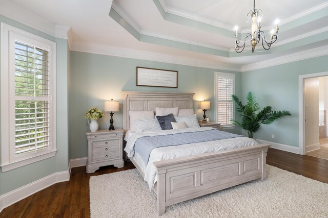 460 Armstrong Way, Evans, GA 30809 - bedroom featuring a chandelier, multiple windows, wood finished floors, ornamental molding, and a tray ceiling
