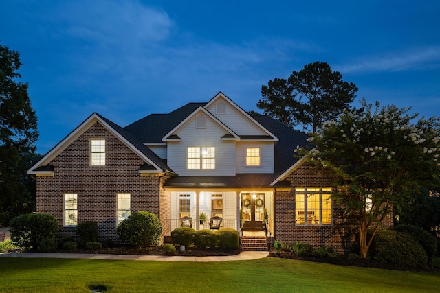 460 Armstrong Way, Evans, GA 30809 - view of front of home featuring brick siding, a front lawn, and a porch