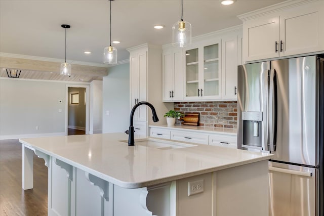118 Lake Bluff Dr, Waynesboro, GA 30830 - kitchen featuring stainless steel fridge with ice dispenser, white cabinetry, a breakfast bar area, dark wood-style floors, and glass insert cabinets