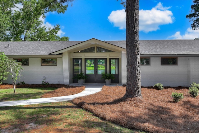 118 Lake Bluff Dr, Waynesboro, GA 30830 - view of front of property with roof with shingles, brick siding, and french doors