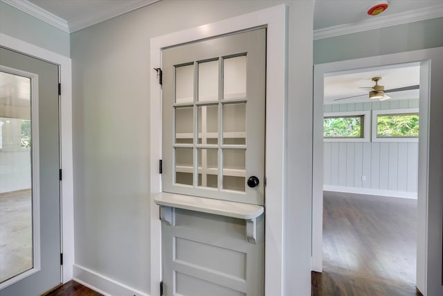118 Lake Bluff Dr, Waynesboro, GA 30830 - doorway with dark wood finished floors, ornamental molding, and ceiling fan