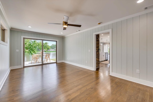 118 Lake Bluff Dr, Waynesboro, GA 30830 - spare room featuring ornamental molding, ceiling fan, wood finished floors, and a smoke detector