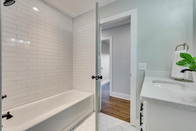 118 Lake Bluff Dr, Waynesboro, GA 30830 - bathroom featuring tile patterned floors, vanity, and bathtub / shower combination