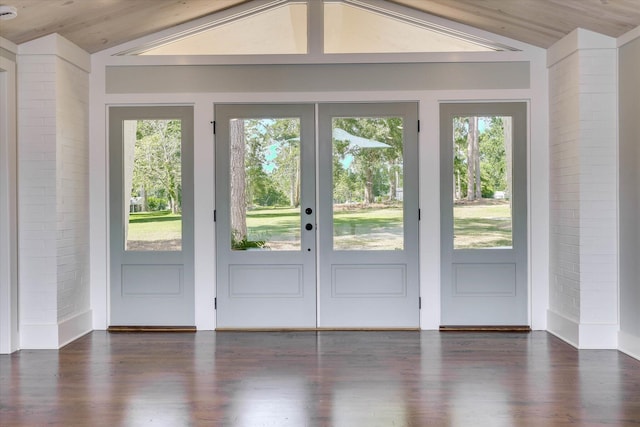 118 Lake Bluff Dr, Waynesboro, GA 30830 - doorway to outside with lofted ceiling, plenty of natural light, french doors, wood finished floors, and brick wall