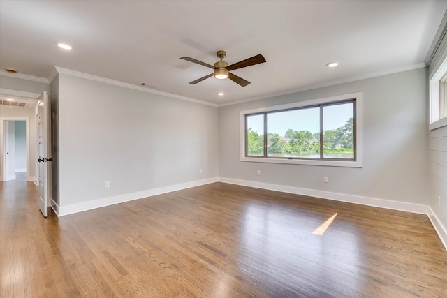 118 Lake Bluff Dr, Waynesboro, GA 30830 - empty room featuring a ceiling fan, attic access, wood finished floors, crown molding, and recessed lighting