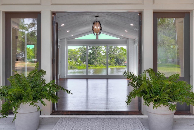 118 Lake Bluff Dr, Waynesboro, GA 30830 - doorway with lofted ceiling, a water view, and recessed lighting