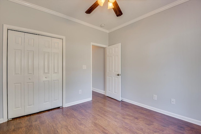 unfurnished bedroom featuring hardwood / wood-style floors, ornamental molding, a closet, and ceiling fan