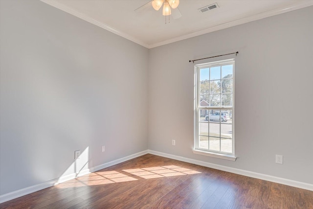 spare room featuring crown molding, light hardwood / wood-style floors, and ceiling fan