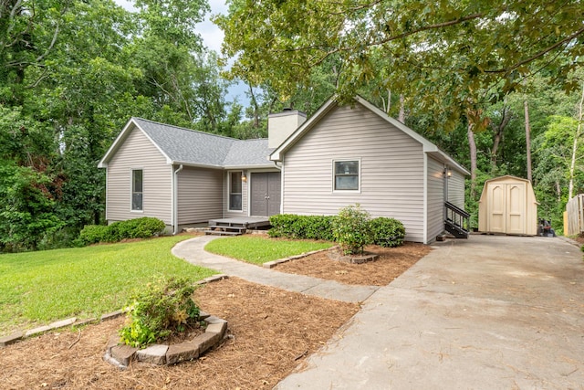 354 Rice Ct, Martinez, GA 30907 - ranch-style house with a storage unit, a chimney, a front lawn, concrete driveway, and roof with shingles