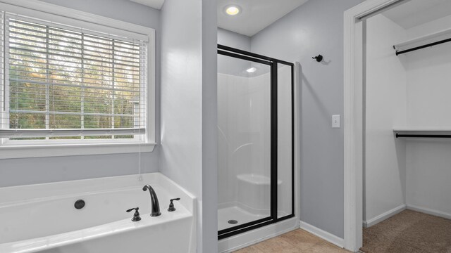 bathroom with plus walk in shower