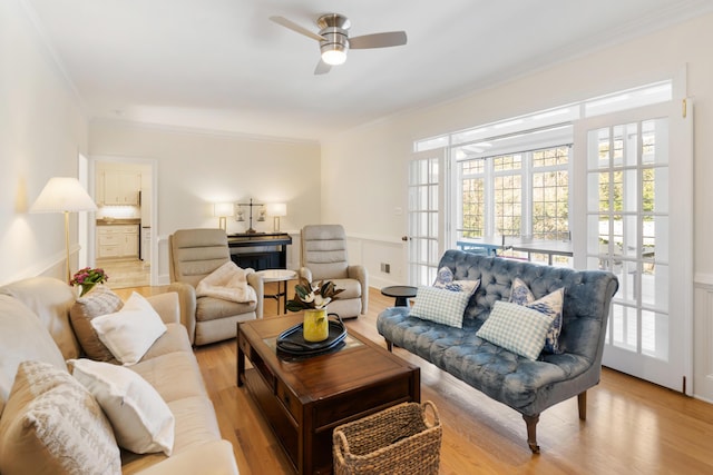 3503 Preston Trl, Martinez, GA 30907 - living room featuring crown molding, ceiling fan, light wood-style floors, and a wealth of natural light