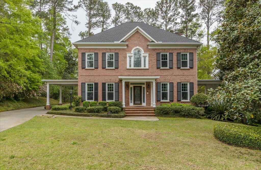 3555 Granite Way, Martinez, GA 30907 - view of front of property with an attached carport, a front yard, brick siding, and concrete driveway