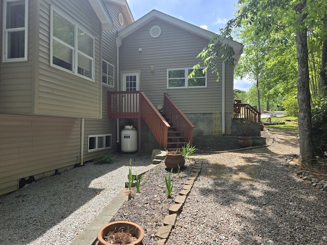 back of property featuring a fire pit