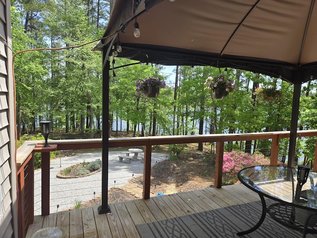 wooden deck with a gazebo