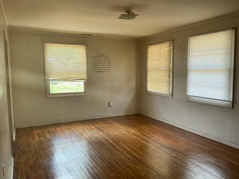 1618 Princeton Ln, Augusta, GA 30904 - spare room with healthy amount of natural light and hardwood / wood-style floors