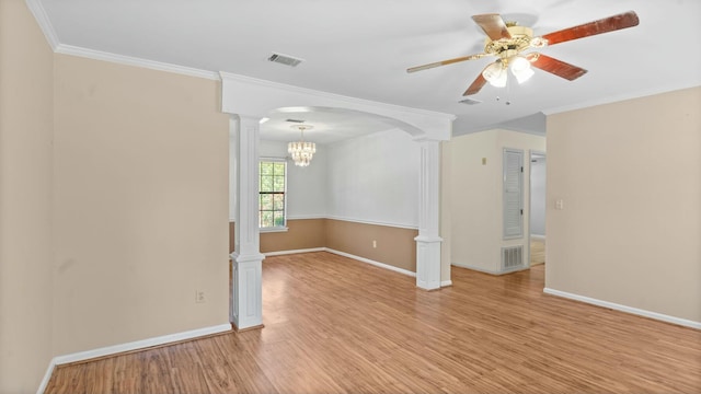 unfurnished room featuring visible vents, light wood-type flooring, ornate columns, and ceiling fan with notable chandelier