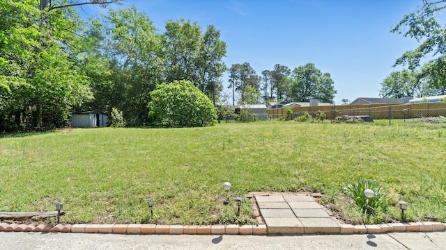 view of yard featuring fence