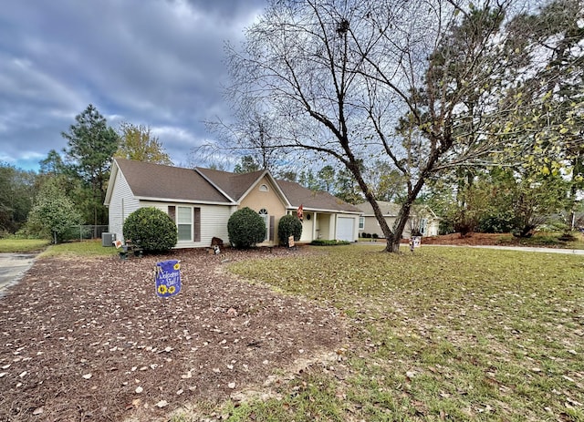 ranch-style home featuring a front lawn