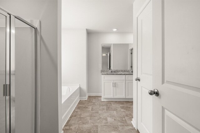 2885 Saltwater Bnd, Beech Island, SC 29842 - bathroom featuring a bath, a stall shower, vanity, baseboards, and recessed lighting