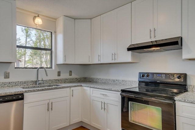 kitchen featuring black range with electric cooktop, under cabinet range hood, a sink, white cabinets, and dishwasher