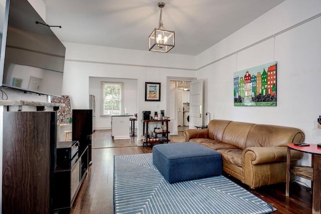 1544 Schley St, Augusta, GA 30904 - living room featuring dark wood-type flooring and a chandelier