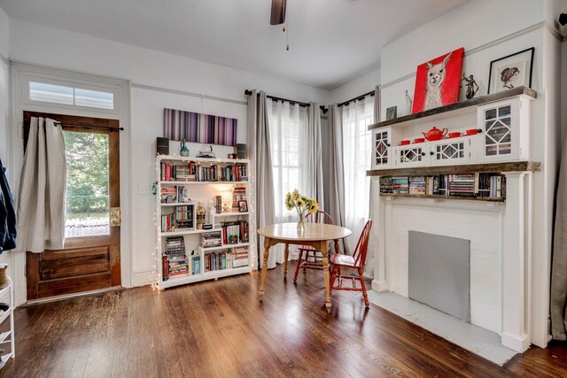 1544 Schley St, Augusta, GA 30904 - dining space featuring a ceiling fan, wood finished floors, and a fireplace
