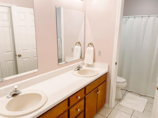 317 Coastal Cv, Mccormick, SC 29835 - bathroom featuring tile patterned flooring, vanity, toilet, and curtained shower