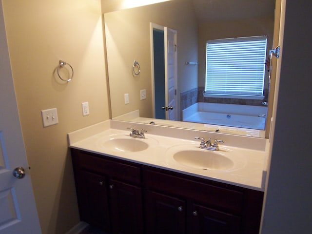 2103 Kaneck Way, Hephzibah, GA 30815 - bathroom featuring double vanity and a garden tub