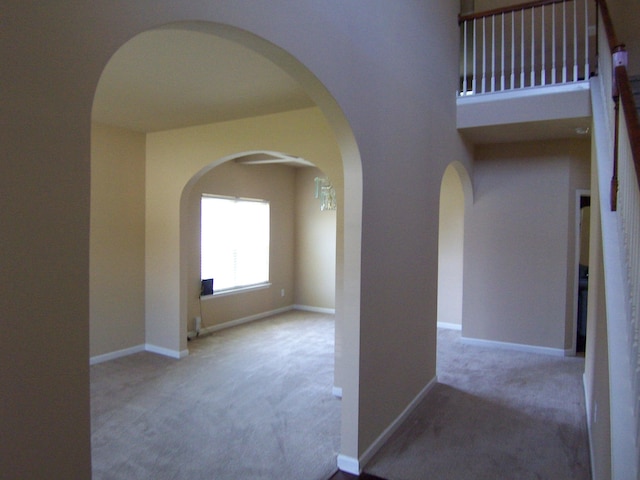 2103 Kaneck Way, Hephzibah, GA 30815 - hallway with carpet, arched walkways, and baseboards