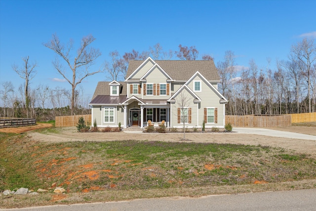 view of front of home with fence