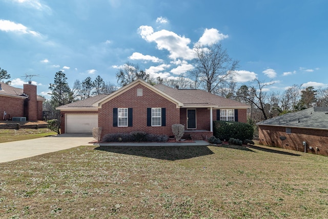 single story home featuring a garage, brick siding, driveway, and a front lawn