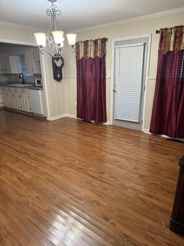 410 Johns Rd, Thomson, GA 30824 - unfurnished living room with a sink, a chandelier, dark wood-type flooring, and ornamental molding