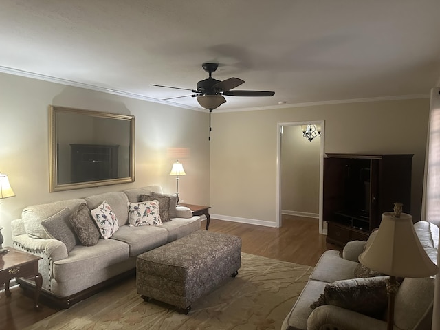 410 Johns Rd, Thomson, GA 30824 - living area featuring a ceiling fan, ornamental molding, wood finished floors, and baseboards