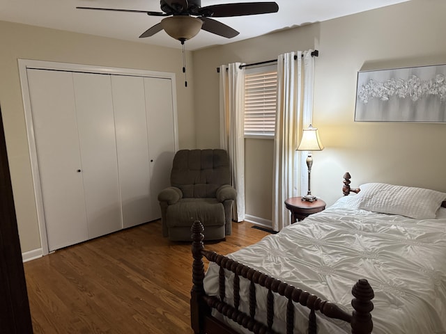410 Johns Rd, Thomson, GA 30824 - bedroom with wood finished floors, a closet, a ceiling fan, and baseboards