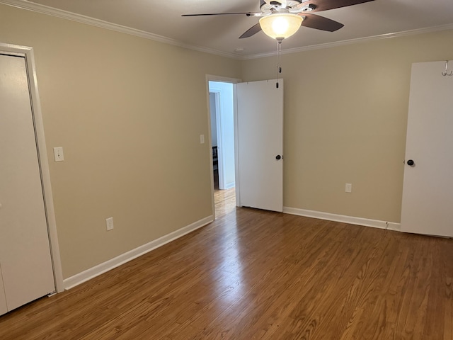 410 Johns Rd, Thomson, GA 30824 - spare room featuring ceiling fan, wood finished floors, ornamental molding, and baseboards