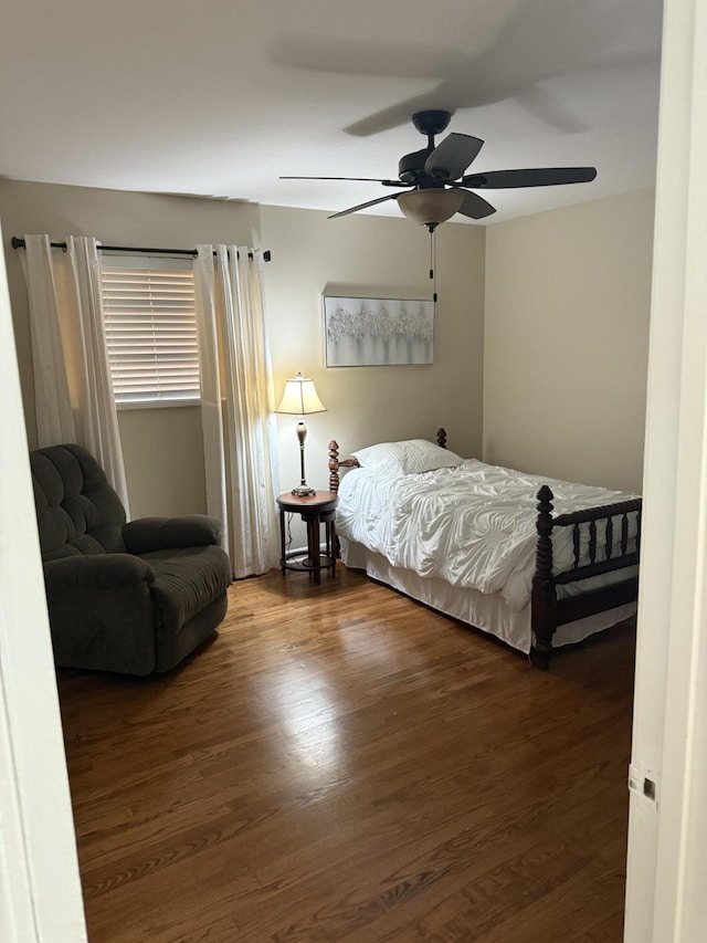 410 Johns Rd, Thomson, GA 30824 - bedroom with wood finished floors and ceiling fan