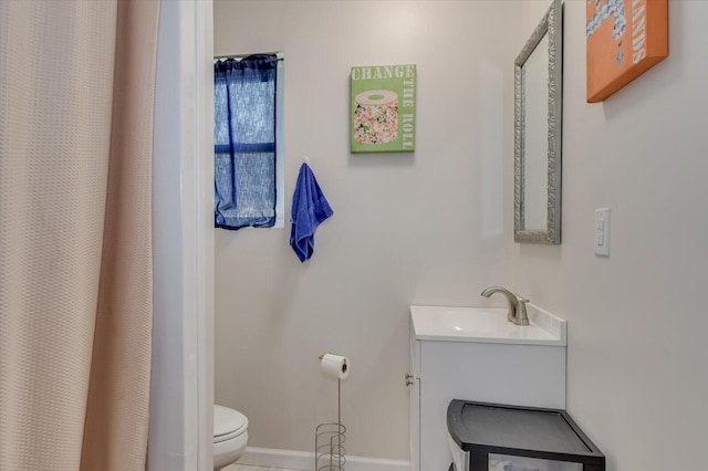 2107 Brown Rd, Hephzibah, GA 30815 - bathroom featuring a shower with shower curtain, baseboards, toilet, and vanity