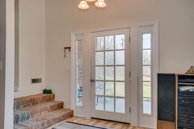 2107 Brown Rd, Hephzibah, GA 30815 - entryway with visible vents, light wood-style flooring, and plenty of natural light