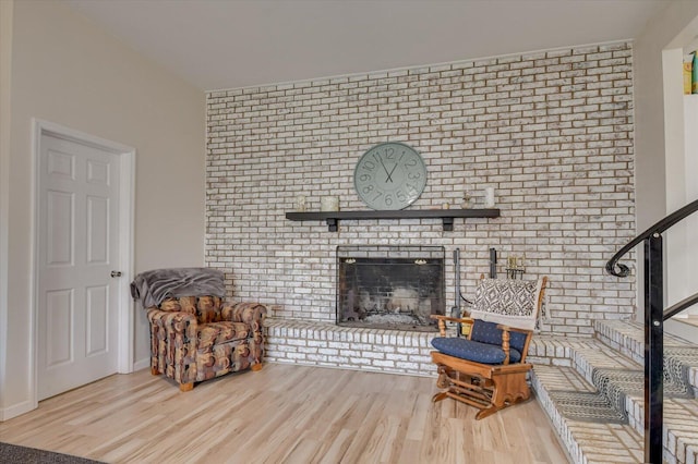 2107 Brown Rd, Hephzibah, GA 30815 - interior space with baseboards, wood finished floors, and a fireplace