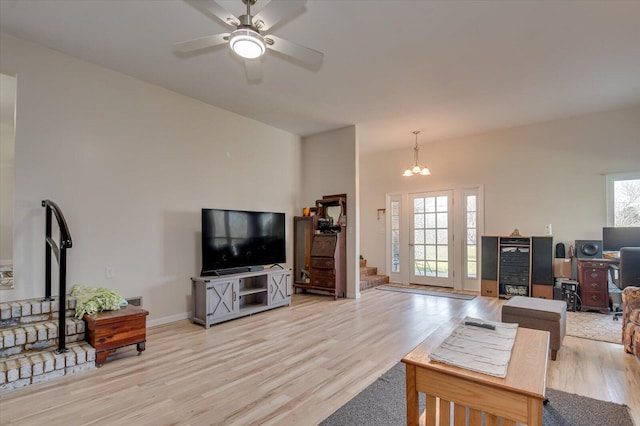 2107 Brown Rd, Hephzibah, GA 30815 - living room featuring stairway, a ceiling fan, baseboards, and light wood finished floors