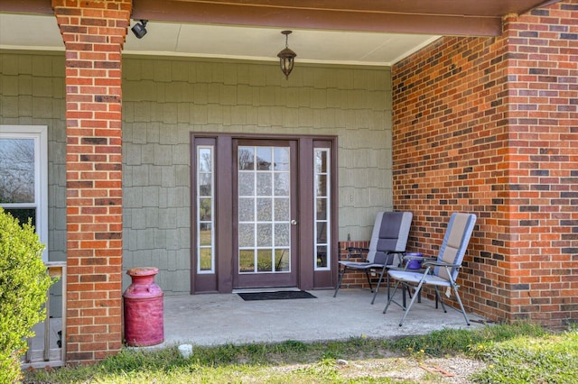 2107 Brown Rd, Hephzibah, GA 30815 - doorway to property with a patio area and brick siding