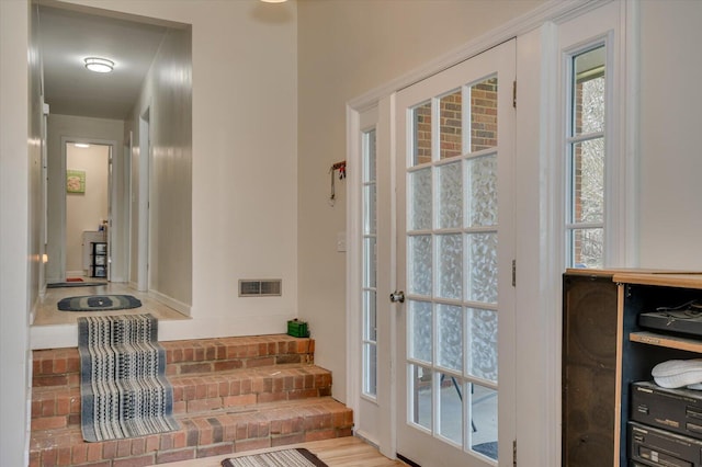 2107 Brown Rd, Hephzibah, GA 30815 - doorway to outside with a wealth of natural light and visible vents